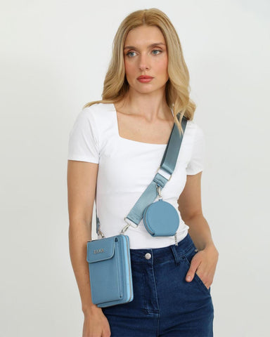 Γυναικεία τσάντα χιαστί θήκη κινητού DOCA σε γαλάζιο χρώμα με κλείσιμο με καπάκι, αποσπώμενο εξωτερικό τσαντάκι, αποσπώμενο/ρυθμιζόμενο ιμάντα και ανάγλυφη υφή. ΤΠΤ080000