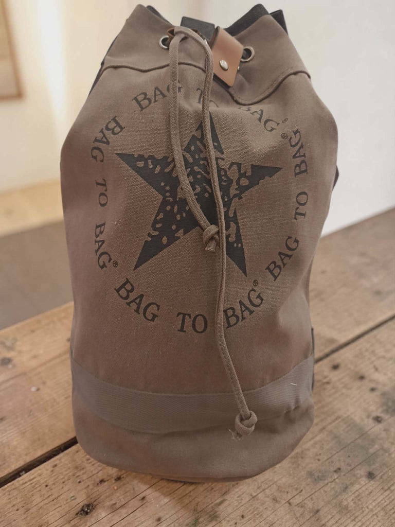 Στρογγυλό σακίδιο πλάτης καμβάς 50x28cm. ΤΠΤ098000