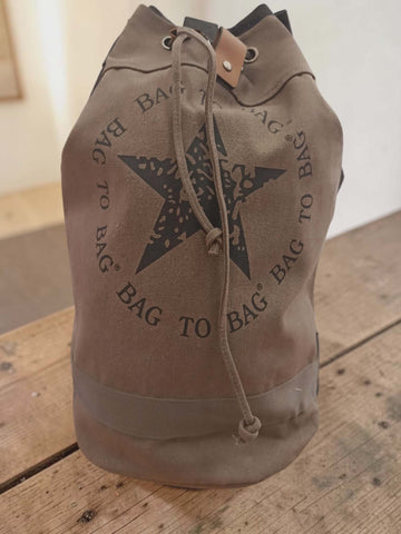 Στρογγυλό σακίδιο πλάτης καμβάς 50x28cm. ΤΠΤ098000