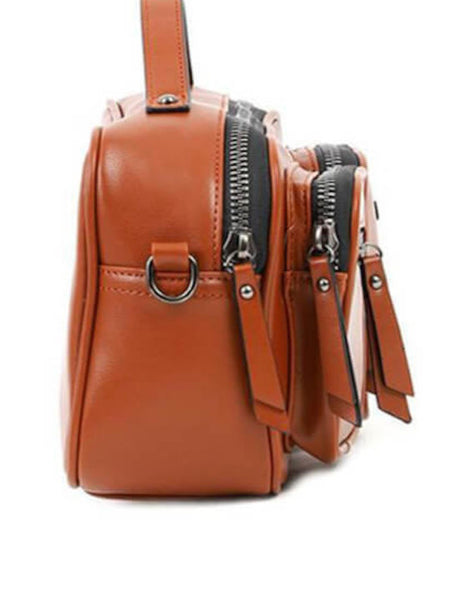 Tσάντα ώμου DOCA χιαστί σε ταμπά χρώμα με ένα ιδιαίτερο σχέδιο με εξωτερικές τσέπες και διακοσμητικές λεπτομέρειες ΤΠΤ990000